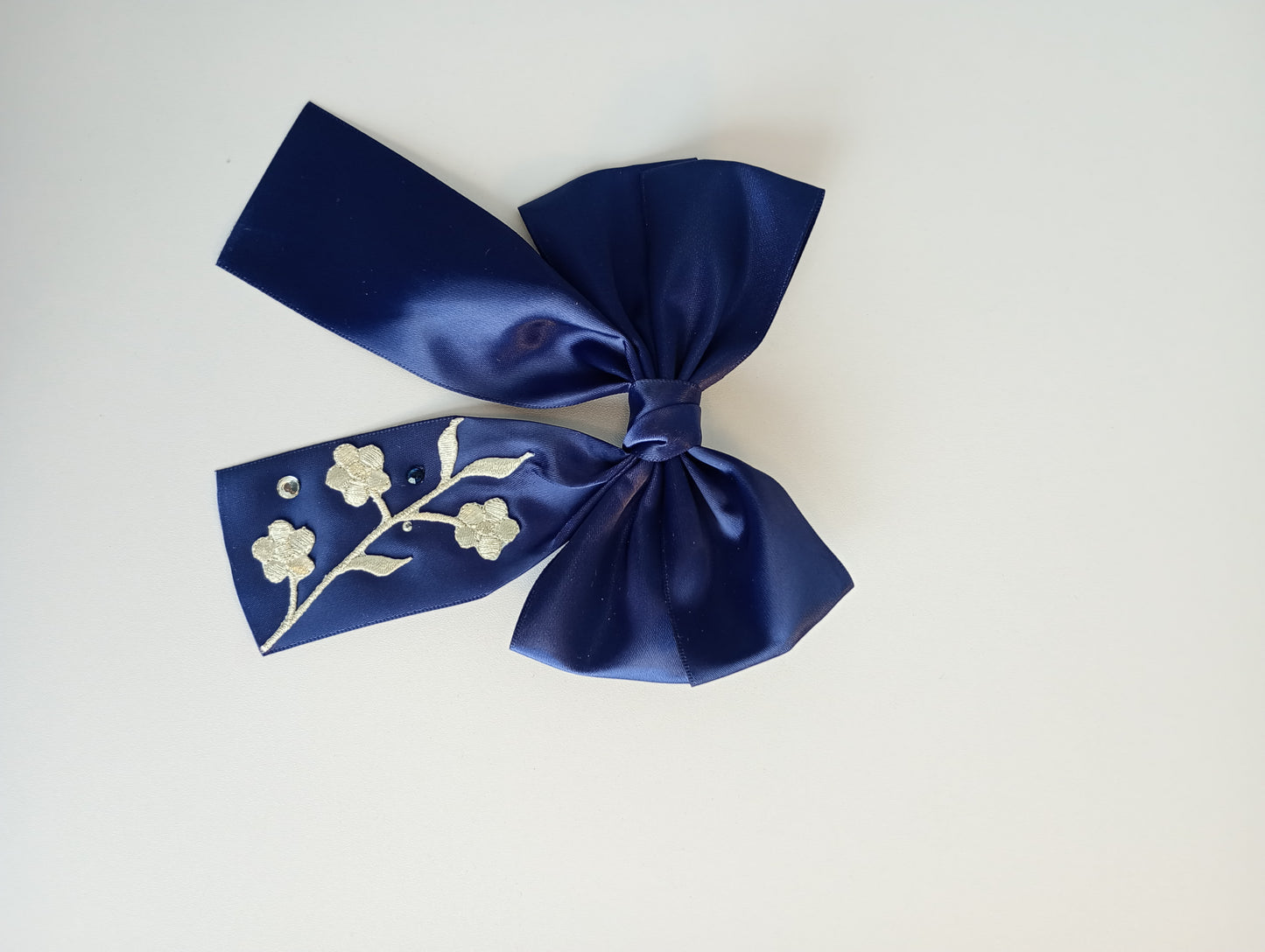 Satin Bow clip, with Floral embroidery.