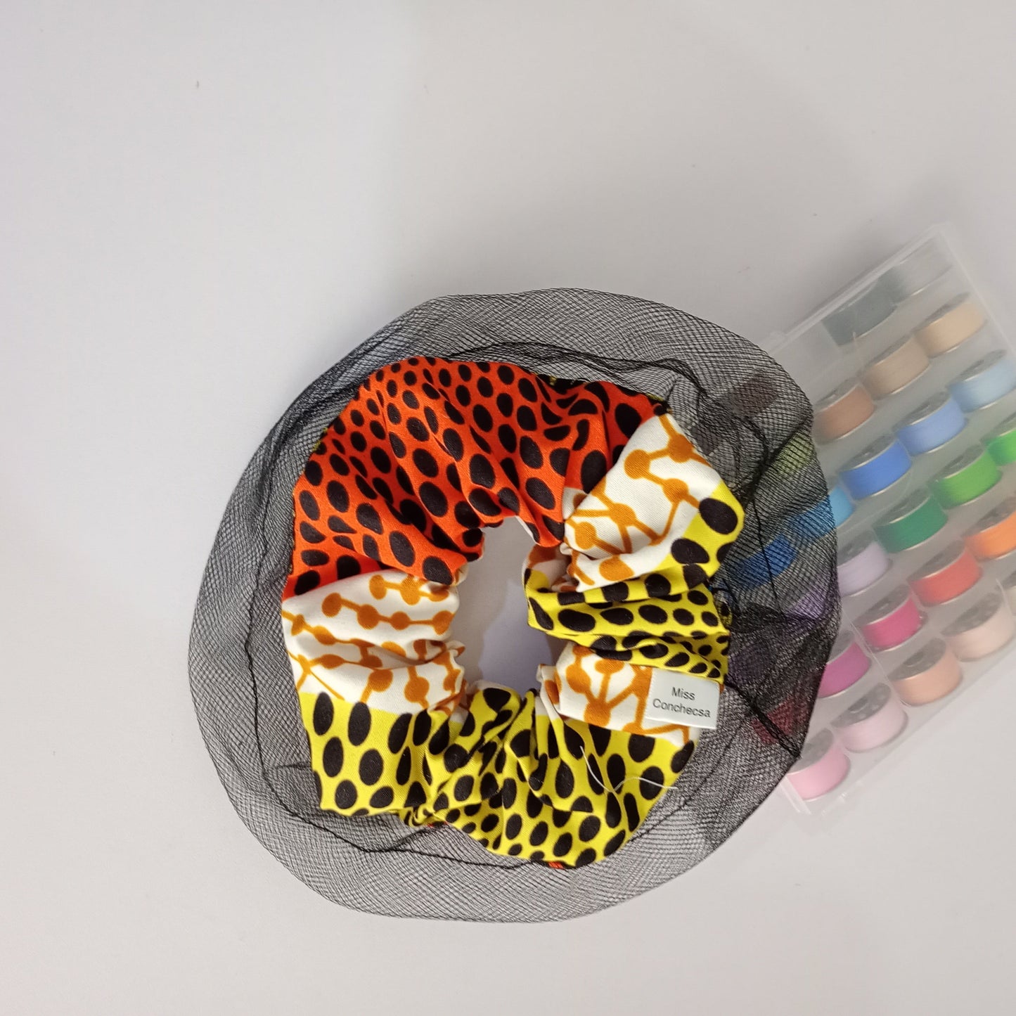 Colorful Ankara scrunchy with black mesh round about
